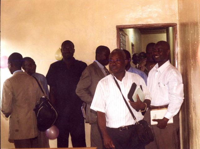 Dea. Karr and some members of the property holding committee guided by Bro. Troyah tour the offices